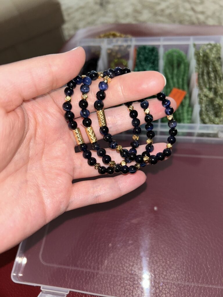 Blue Tigers Eye Bracelets In Hand