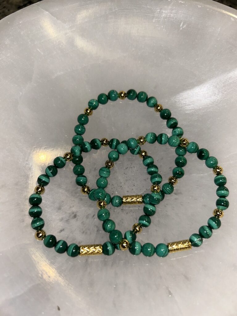 Three Malachite Gold Bracelets in a Triangle On Tray