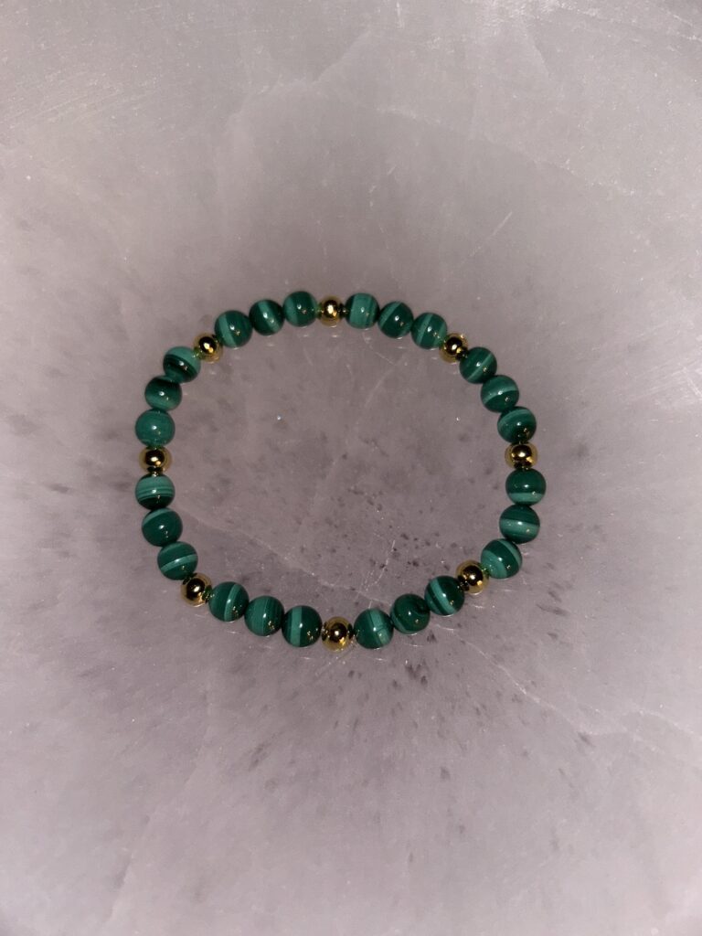 Single Malachite Gold Bracelet on Dark Marble