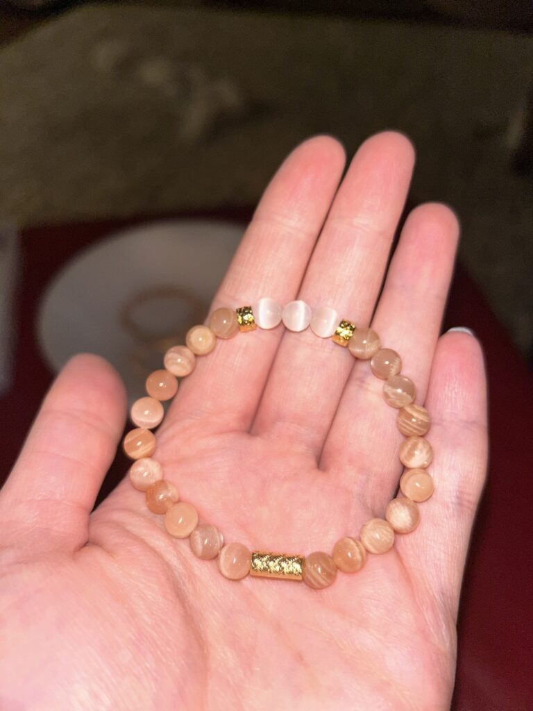 Single Peach Moonstone Bracelet in Hand